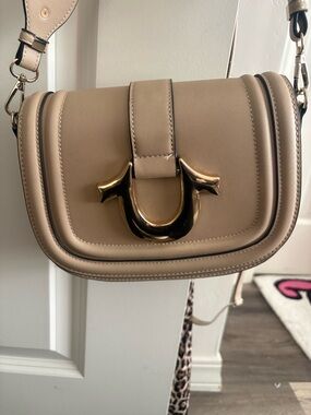 True Religion Beige Crossbody Saddle Bag with Gold Hardware